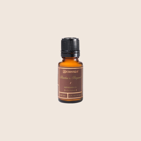 Bourbon & Bergamot Refresher Oil is designed to refresh your Decorative Fragrance year-round. The highly concentrated oil quickly absorbs into the wood chips and fills any space with bold citrus softened with cashmere musk and hints of bourbon.